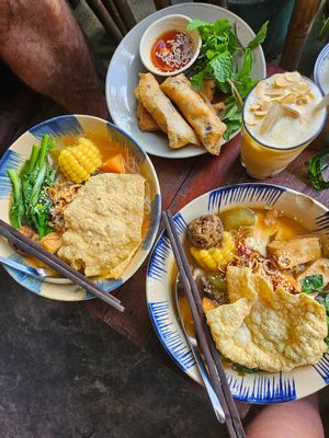 Thong dong noodle soup, fried spring rolls, mango mylkshake at Thong Dong Vegan Kitchen & Cafe in Lao Cai