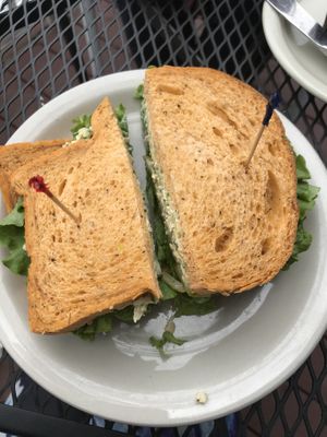 Mock chicken salad on tomato bread with lettuce and pickles! at Wild Oats Bakery and Cafe in Brunswick