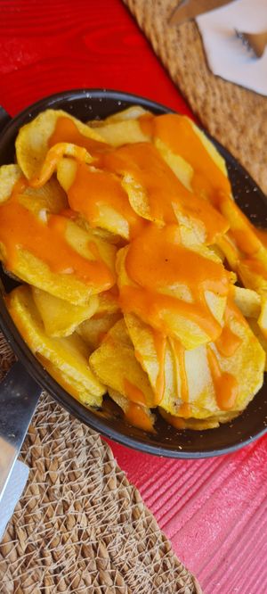 Spicy potatoes 🫶 at La Vida Bonita Beach Club in Santa Pola