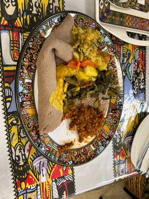 Vegetarian plate with teff flour bread. Very tasty!  at Ethio Beans Ethiopian Restaurant and Cafe in Carol Stream