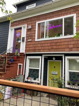Exterior- steps to upstairs entrance  at Shikorina Bakeshop & Cafe in Seattle