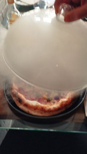 Pizza fumada at Pizzeria Km0 in Valencia