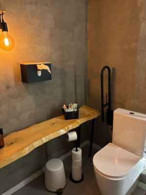 The women's bathroom was super clean and well stocked with lots of pads and tampons! at Pizzeria Km0 in Valencia