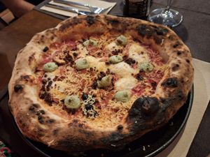 Pizza chulilla at Pizzeria Km0 in Valencia