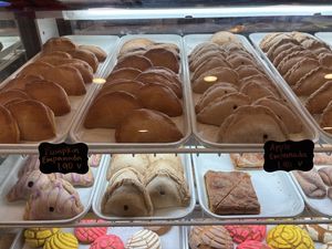 Vegan options labeled with a V  at Panaderia Jiménez & Coffee Shop in San Antonio