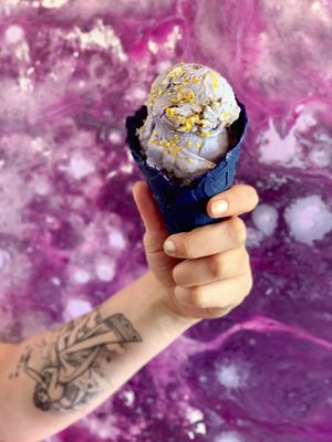 Dark Side of the Spoon flavor served in a blue corn chip waffle cone. at Sweet Ritual in Austin