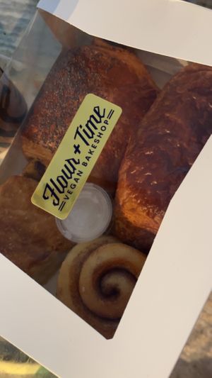 Vegan cinnamon roll, bakon egg and cheese croissant, pain au chocolat, and a biscuit #Veganuary at Flour + Time Bakery in Atlanta