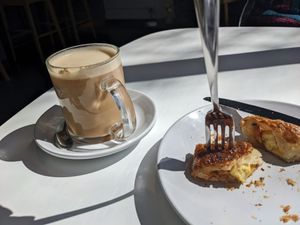 Chai Tea Latte and Bakon, Egg, and Cheese Croissant.  at Flour + Time Bakery in Atlanta