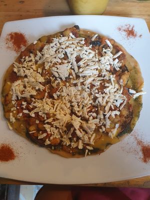 Vegan pizza with mushroom, aubergine, pesto and some kind of soy meat at Lenteja Express - Poblado in Medellin