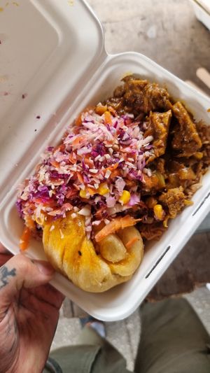 Vegan goat curry, rice, Dumpling and coleslaw at Michaels Caribbean Storehouse in Wolverhampton