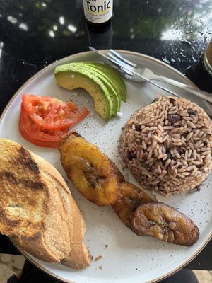 Rice and beans, avocado, tomato and sweet plantains    at La Artesanal in Jaco
