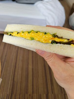 Egg sando. Hands down the best vegan version of an egg salad sandwich I've ever had. I purchased two to take home with me and they didn't make it past KIX.  at MERCY Vegan Factory in Osaka