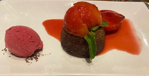 Chocolate cake with plum and port compote at David Bann Restaurant in Edinburgh