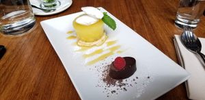 So tasty...the flavors of the orange marmalade with dark chocolate and then separately the  pineapple jelly with lemon cake. at David Bann Restaurant in Edinburgh