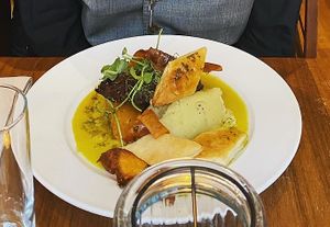 Haggis, neeps and tatties with puff pastry - Puy lentil haggis and turnip with homemade puff pastry. Served with potato mash and Scotch whisky sauce. [vg]  at David Bann Restaurant in Edinburgh