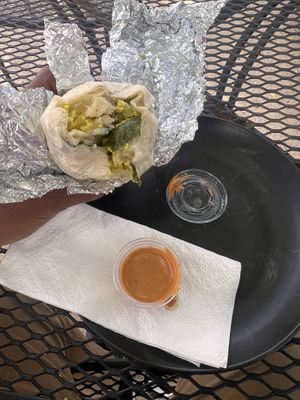 B fast burrito and spicy saucee  at East Village Cafe in Monterey