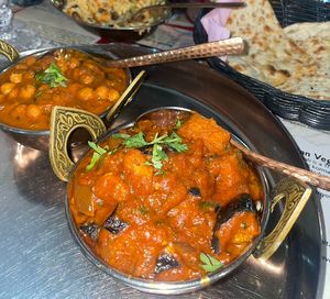 chana masala & aloo baingan masala & peshwari naan  at Indian Thali Express in Paphos
