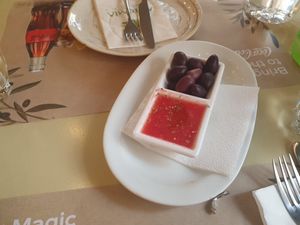 Complimentary olives and tomato sauce at Agrimia Restaurant in Crete