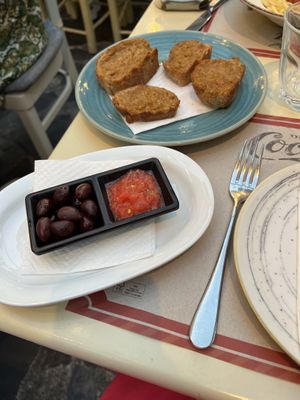Garlic bread (made with oil) and tomato dip with kalamata olives  at Agrimia Restaurant in Crete