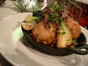 Smokey Bok Choy - That’s a 30 year old sourdough base for those fritters. Unbelievably delicious    at Avant Garden Bistro in Los Angeles