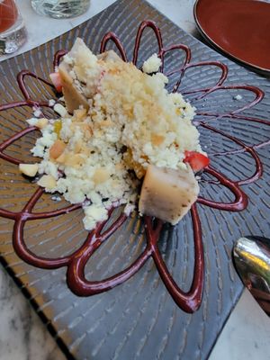 Coconut Mochi Cake
-

Pineapple, Macadamia, Berry Jamaica Sauce at Avant Garden Bistro in Los Angeles