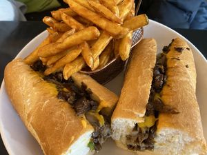 Loaded Cheesesteak with Seasoned Friess  at Vegan Vibes Cafe & Juice Bar in Philadelphia