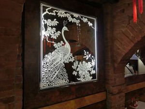 Beautiful mirror art at Ristorante Shanghai da Liu in Siena