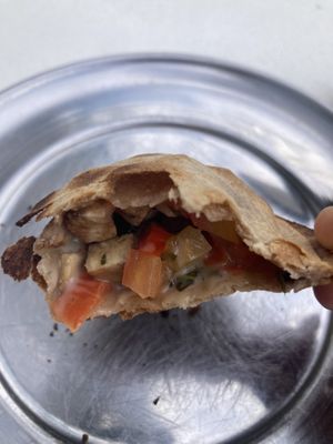 Empanada de tofu, tomate y “queso"  at Coma Veggie in Buenos Aires