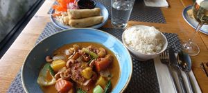 Masaman curry, rice and spring rolls at Thara Thai in Bromley