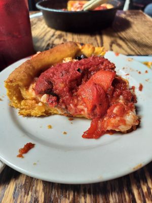 I chose fresh garlic, roasted peppers and olives as my toppings. Very tasty! at Gino's East - South Loop in Chicago