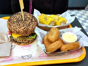 Nuggets, corncob and burger at The Sunny Burger Co. in Amsterdam