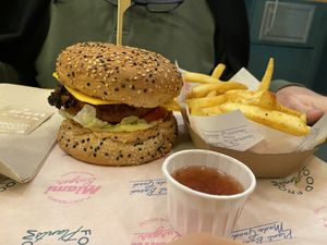 Chicken burger and Cajun fries. We chose a ginger chili sauce for fries (large sauce selection to choose from!)    at The Sunny Burger Co. in Amsterdam
