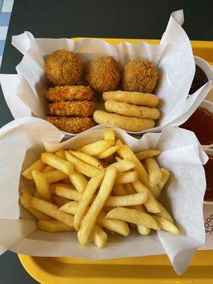 Fries and 9-pack with nuggets, onion rings and Dutch originated balls (forgot the name).  at The Sunny Burger Co. in Amsterdam