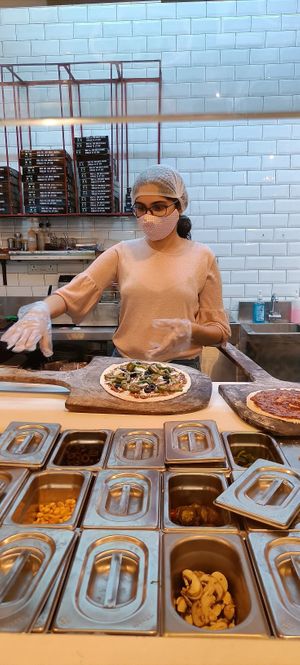 Make your own pizza at 1441 Pizzeria Koregaon Park in Pune