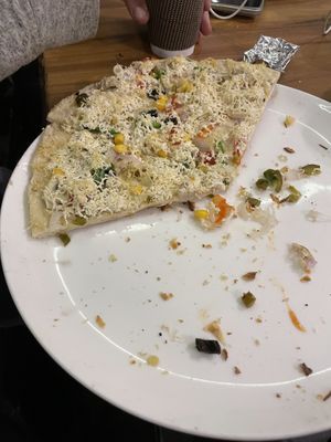 The vegan pizza - dry with no marinara   at The 60's Cafe  in Rishikesh