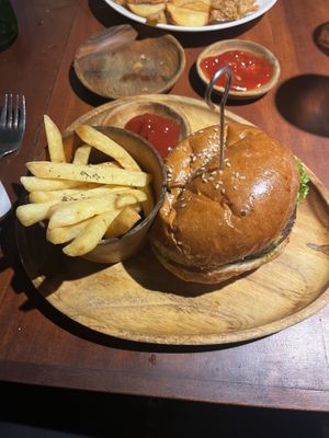 Burger with cheese  at Black Forest Cafe in Yogyakarta