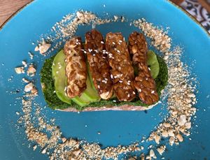 Pesto avocado tempeh toast!  at Nyom Nyom in Tibubeneng