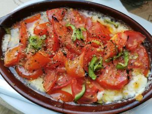 Vegan baked feta dish at Mpakalógatos in Naxos