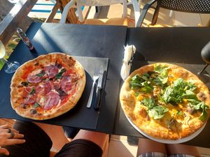 pizza autunna (right) at Italian Mattarello Pizzeria in Sarande