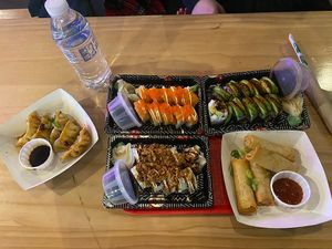 Vegetable gyozas (delish) and spring rolls (fine) and top right vegan sushi (delish).   at Manzoku in Manchester