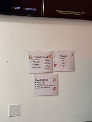 Labels for vegan and gluten free sauces  at PokiTomik in North Hollywood