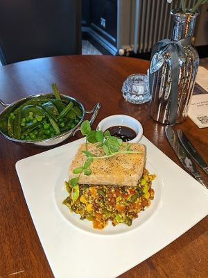 Crispy teriyaki tofu on grain salad, with a side of seasonal greens at Bankend Bar & Brasserie in Dumfries