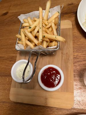 The Seasoned Fries, with an OUT-OF-THIS-WORLD homemade raspberry ketchup. at Belse Restaurant NYC in New York City