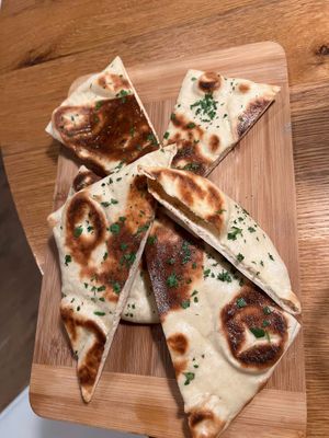 The (divine) flat bread that come with the Edamame Hummus. at Belse Restaurant NYC in New York City