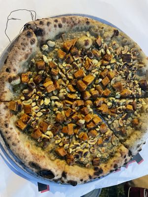 Vegan curry cashew pizza  at Salt Point Brewing Co in Lansing