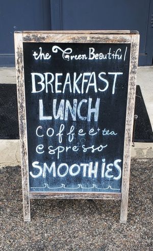 Outside sign at The Green Beautiful  in Manchester