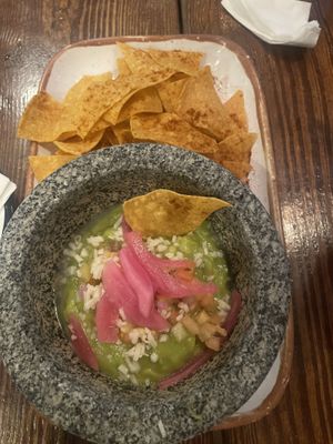Chips and guacamole with vegan cheese  at Xolo Taco in San Juan