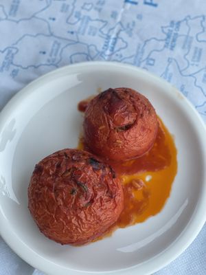 Rise stuffed tomatoes by grandmas recipe   at Stamatis Restaurant & Grill in Patmos