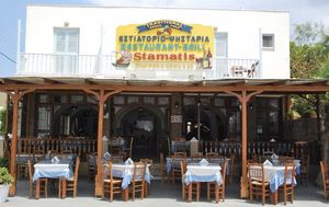 Nice outdoor seating with sea view   at Stamatis Restaurant & Grill in Patmos