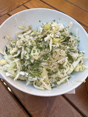 Cabbage salad garnished with dill  at Snow Restaurant in Sinaia